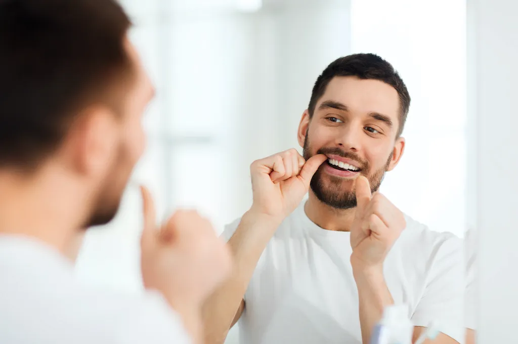 usar seda dental